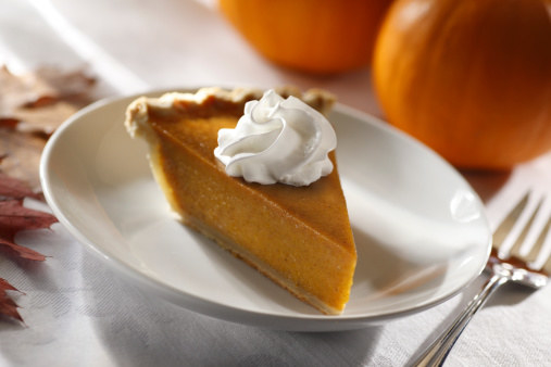 photo of pumpkin pie with whipped cream
