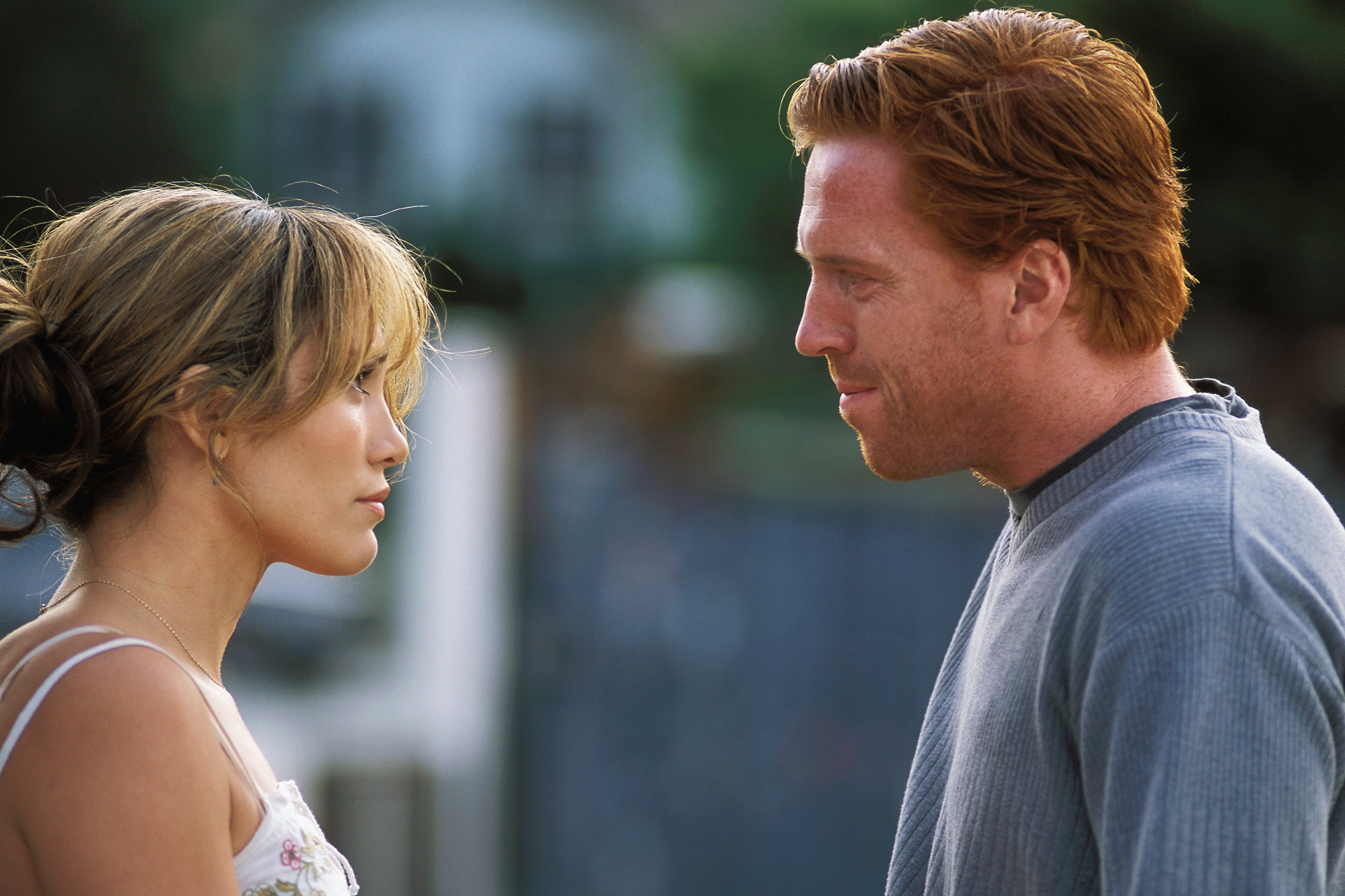 JLo and Damian Lewis look at each other