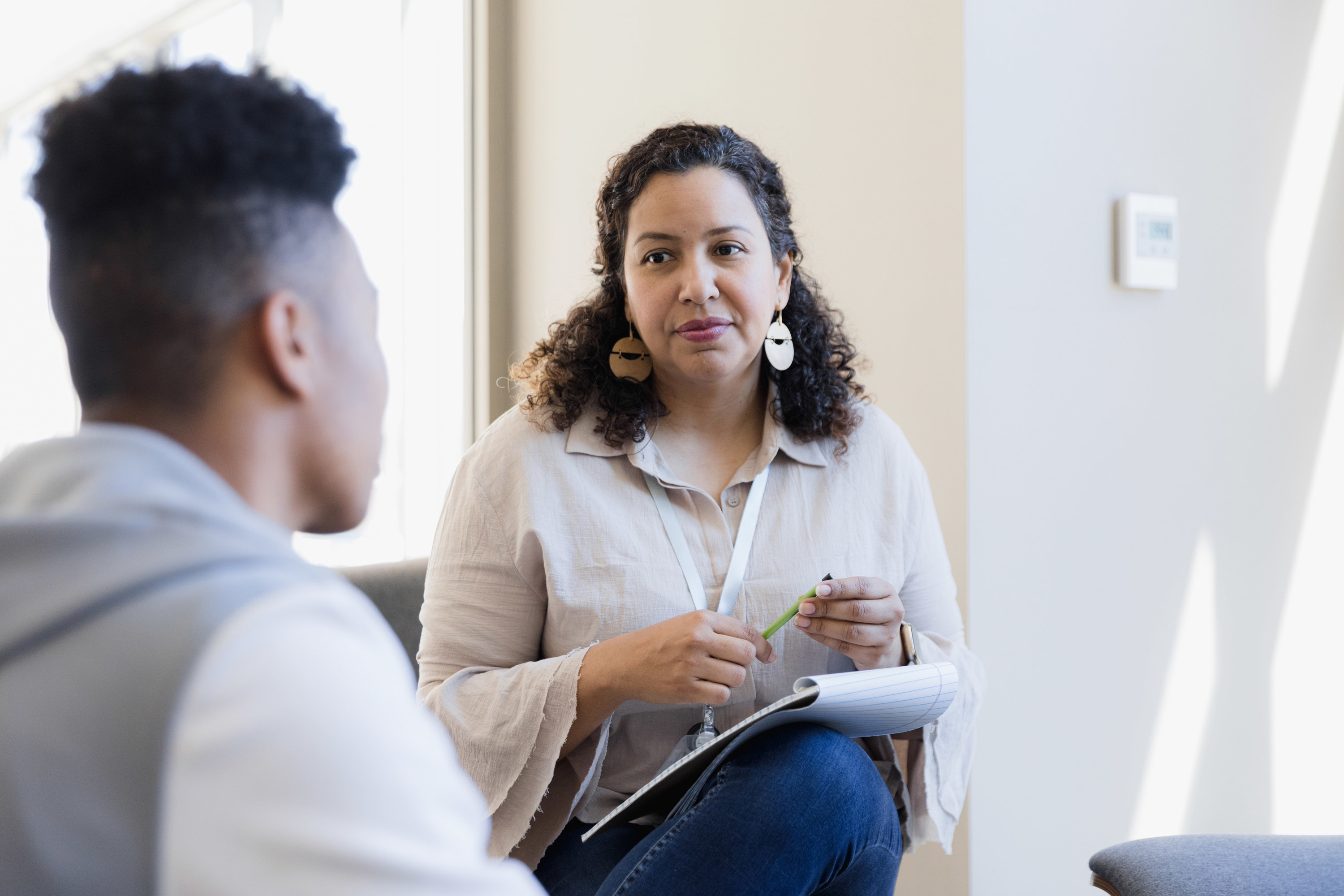 a psychologist talking to a client