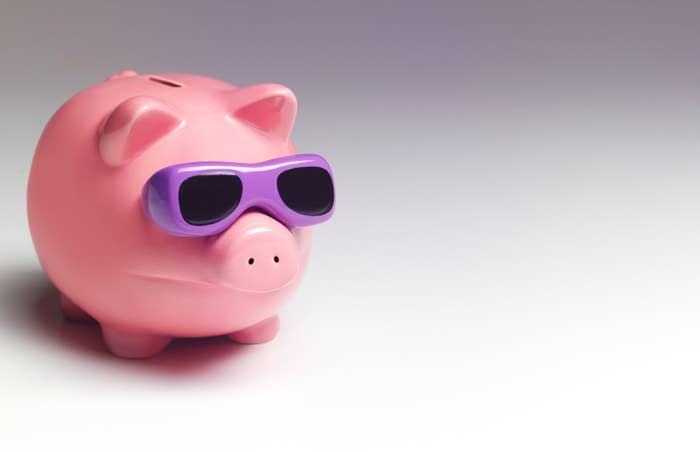 a piggy bank wearing sunglasses