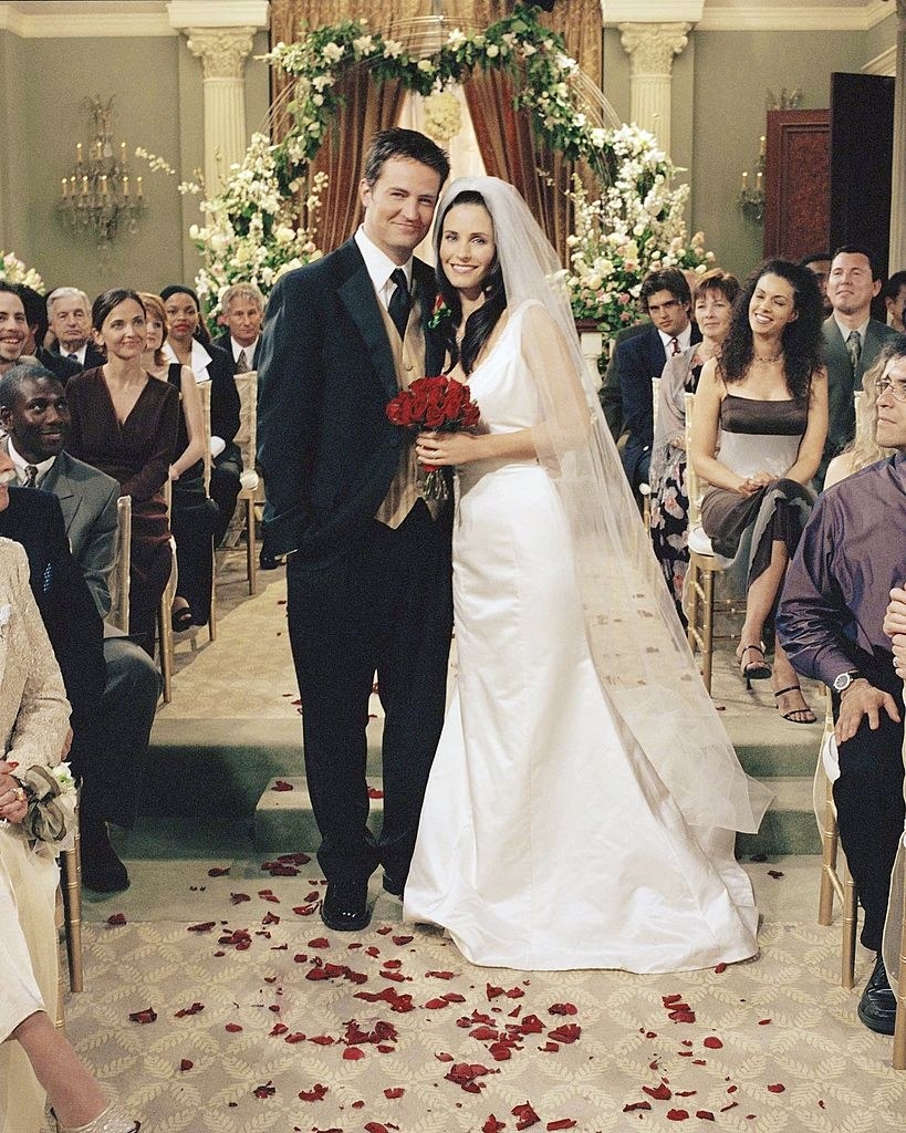 Monica and Chandler smiling on their wedding day