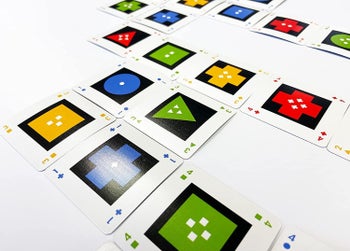 the cards laid together on a table