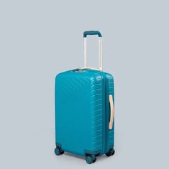 a teal suitcase with the handle pulled up