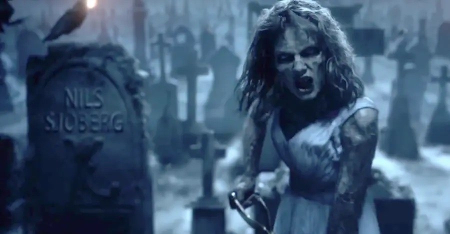 A screenshot from the &quot;Look What You Made Me Do&quot; music video, where Taylor is dressed as a corpse in a graveyard - a gravestone reads &quot;Nils Sjoberg&quot;