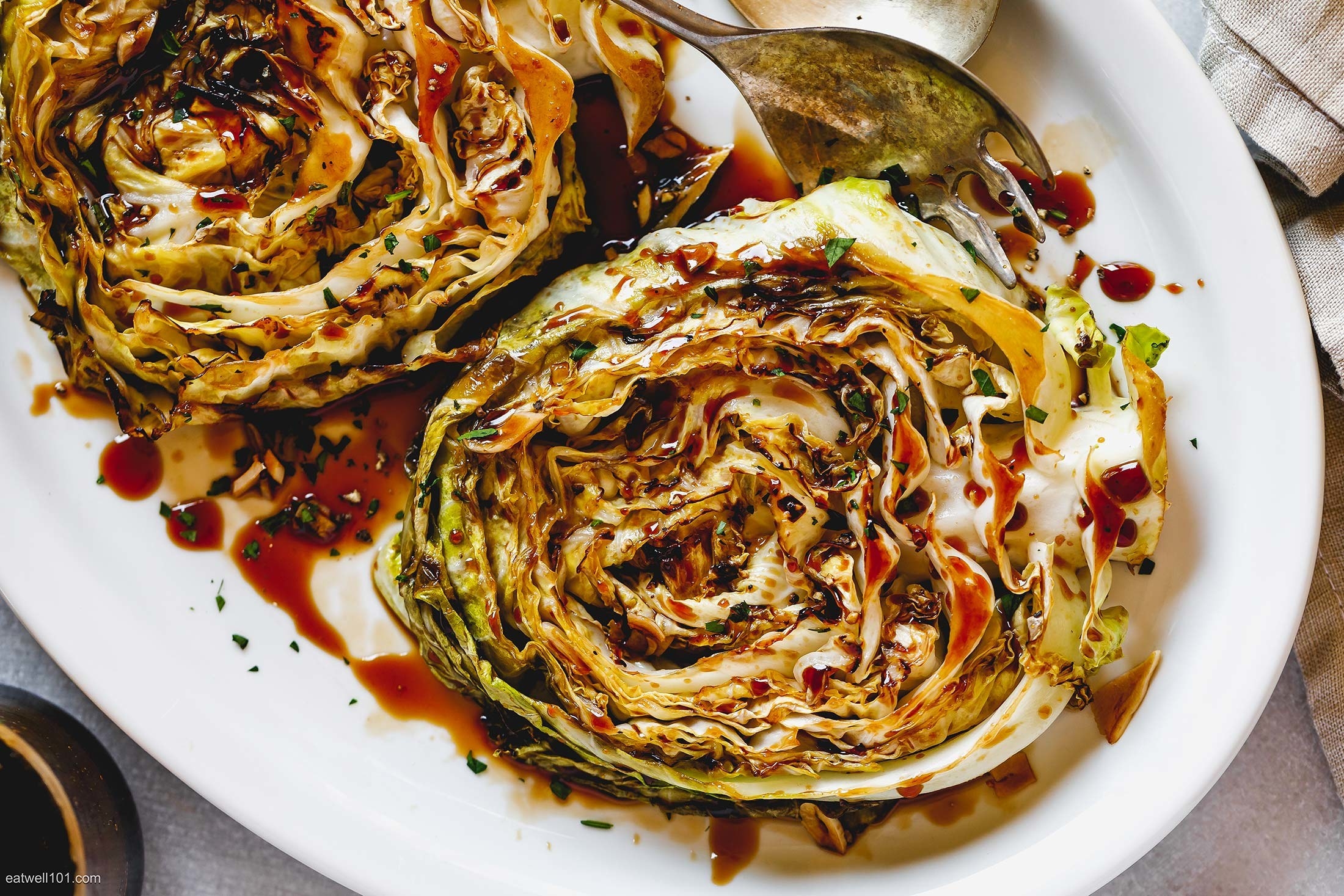 Roasted cabbage steaks with balsamic drizzle