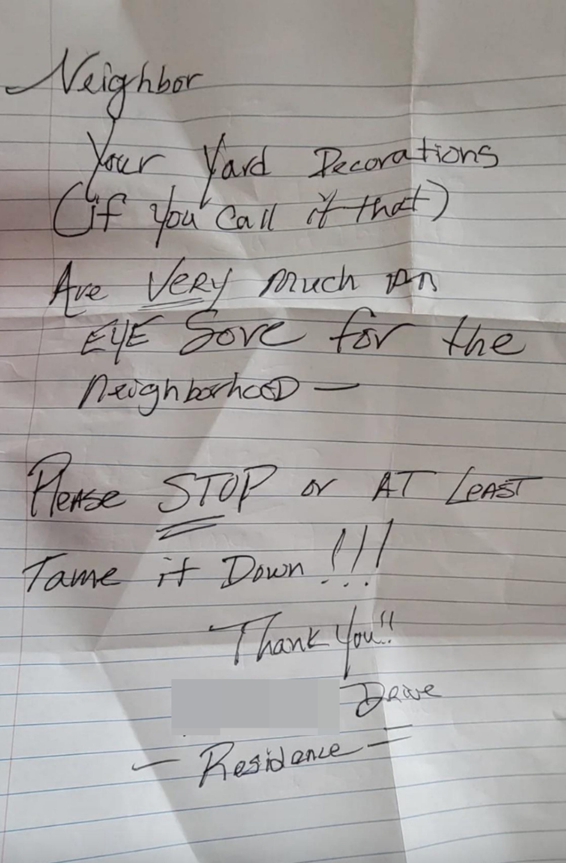 A note telling someone their lawn decorations are an eye sore and asking that they be taken down