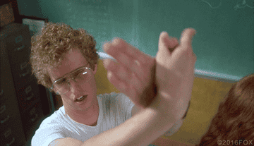 napoleon dynamite flapping his hands together to look like a butterfly