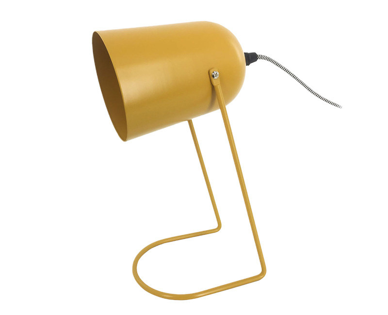 A small, yellow table lamp