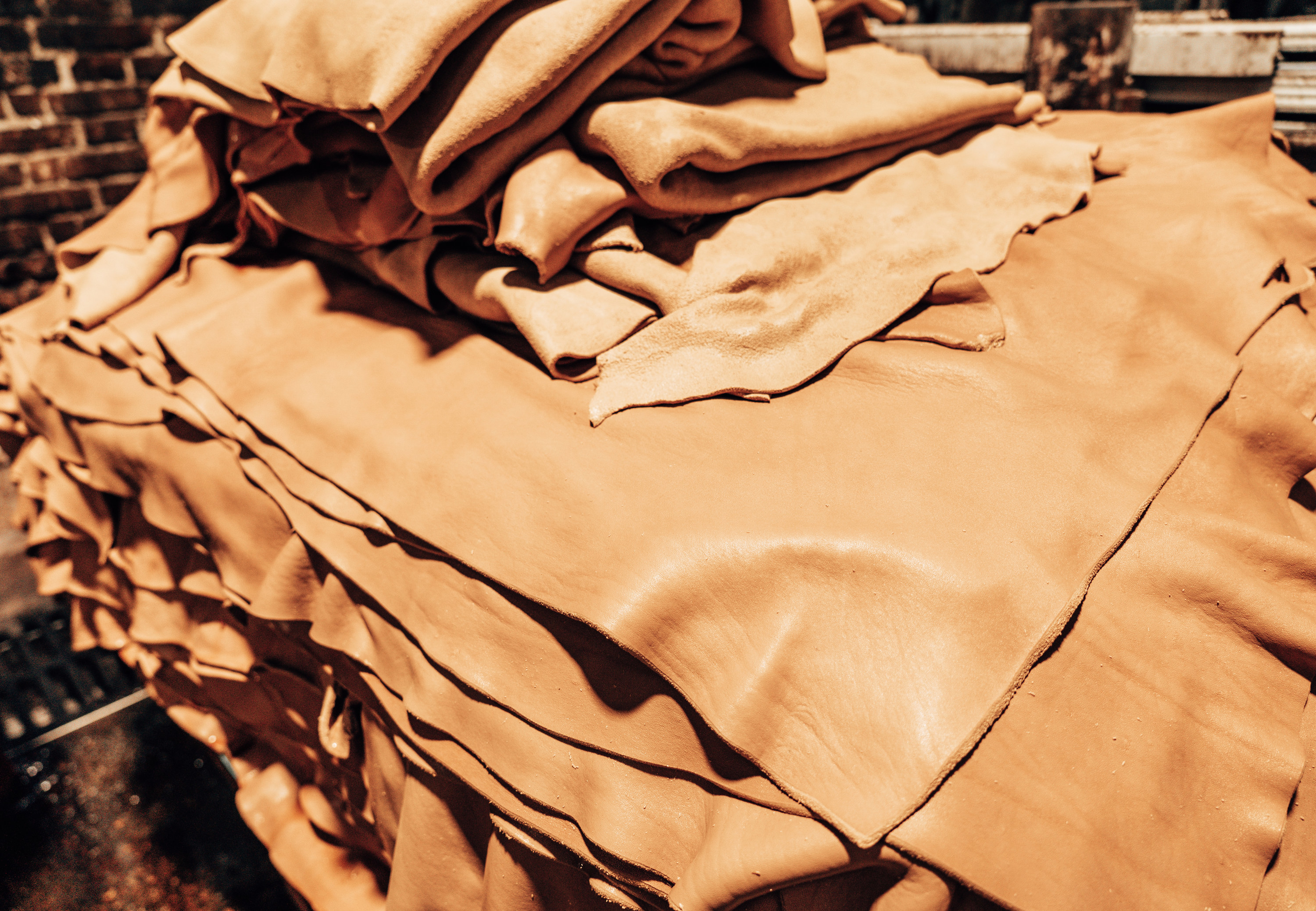 stack of leather in a tannery