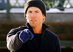 gif of Ryan Reynolds in &quot;Just Friends&quot; pointing at the camera and then turning their thumb down