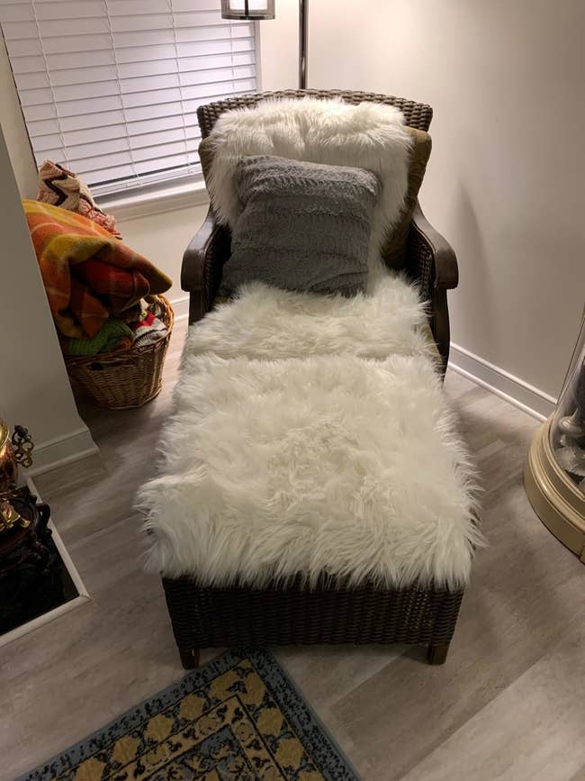 white faux sheepskin rug on a lounge sofa chair