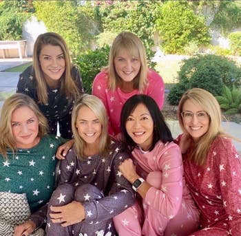 a group of friends all in the starry pajamas in different colors