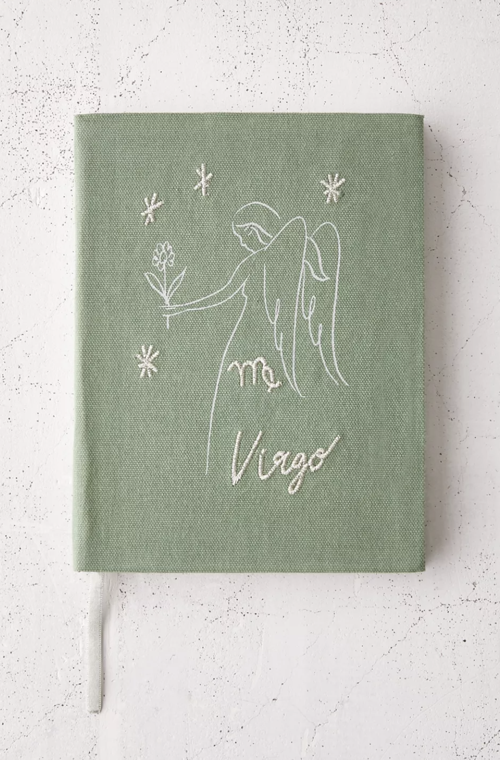 the green virgo journal with an embroidered angel on the cover