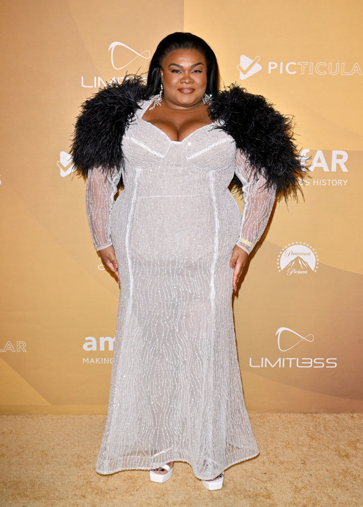 Da&#x27;Vine Joy Randolph wore a sequined see-through dress with feathered shoulders