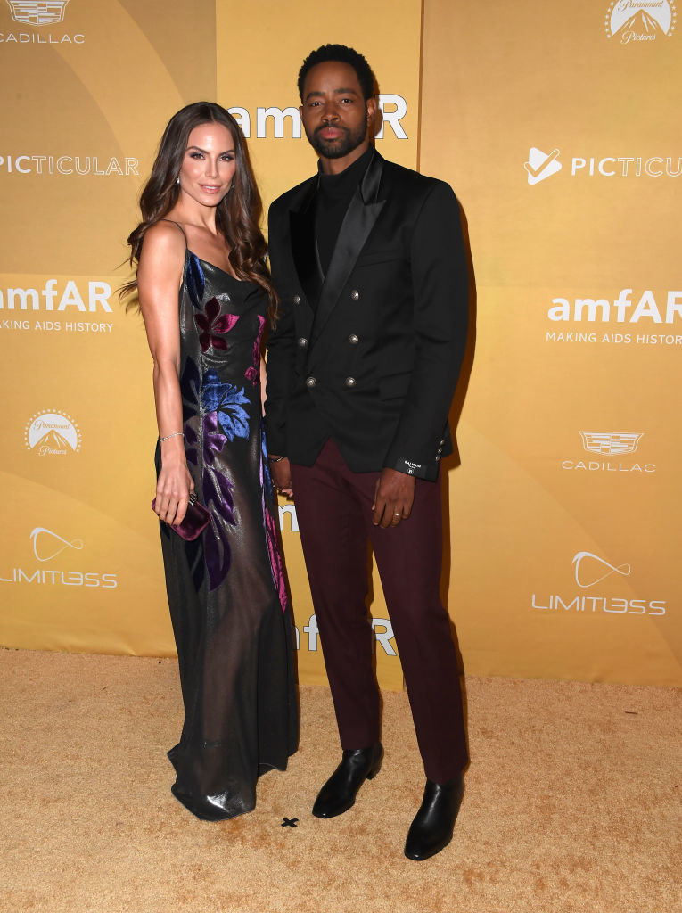 Nina wore a floral-printed spaghetti strap dress and Jay wore a single-breasted suit
