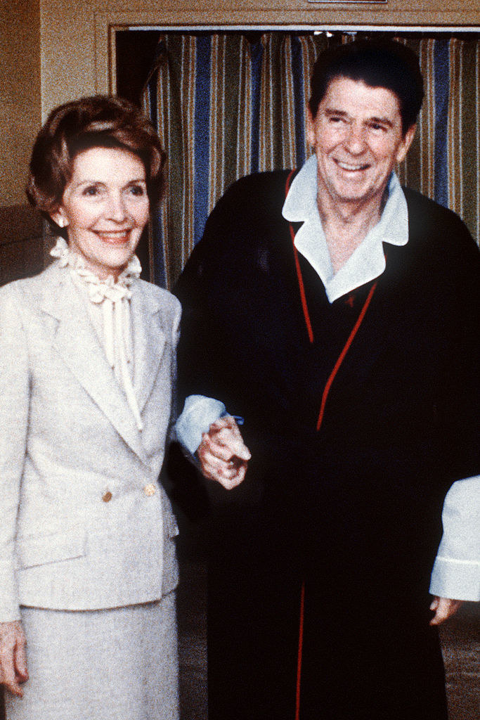 Ronald and Nancy Reagan holding hands