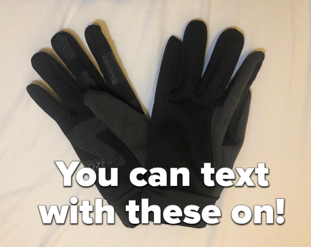 reviewer image of black tech gloves laying on bed