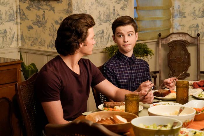mother and son having dinner