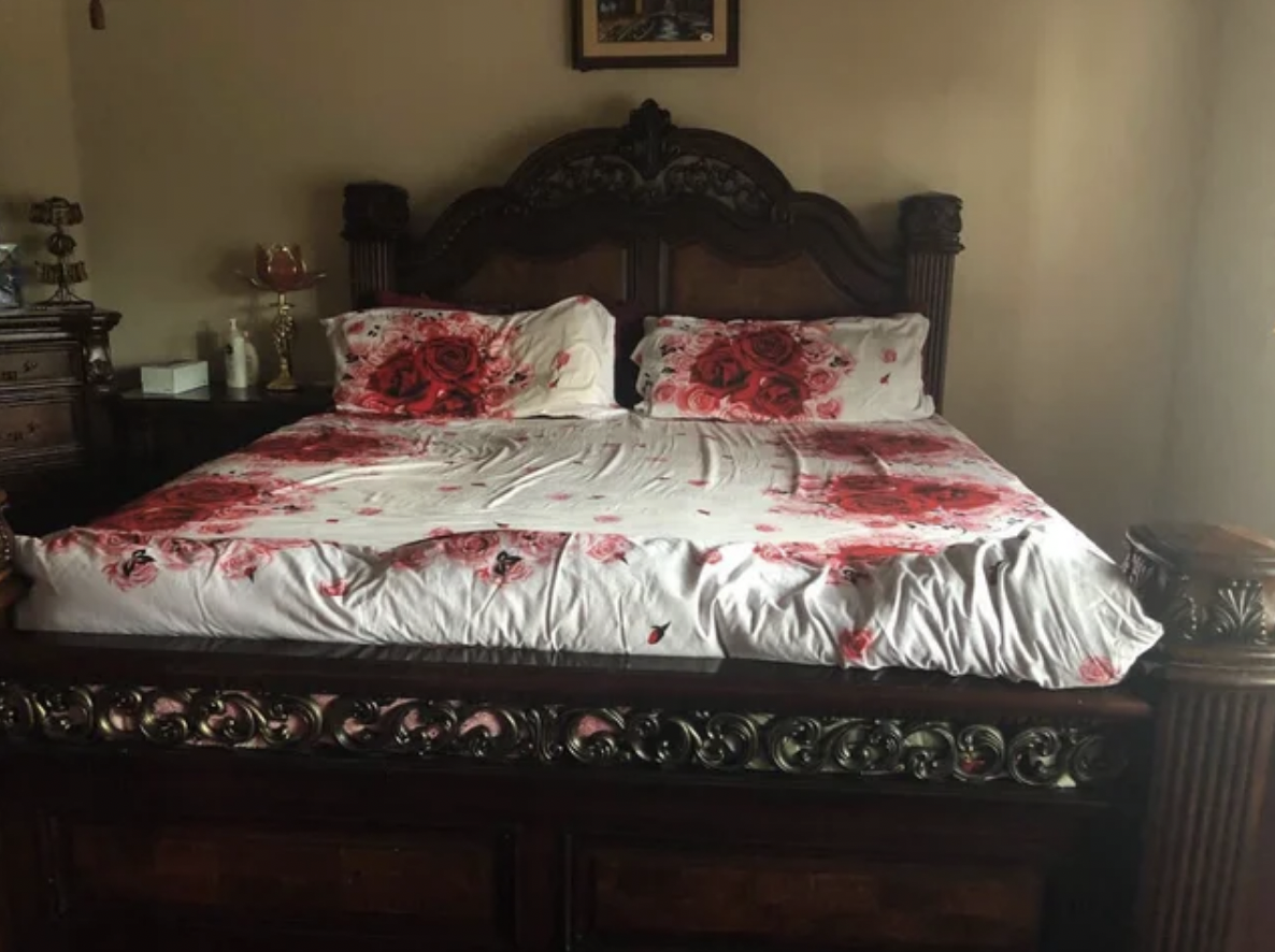The sheets have red flowers on them