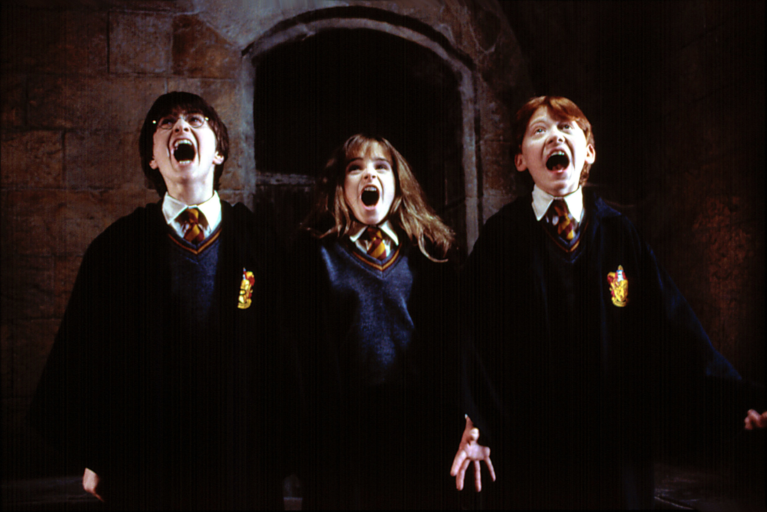 Daniel Radcliffe, Emma Watson, and Rupert Grint all scream in Hogwarts robes