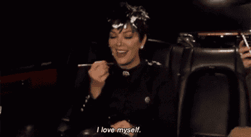 Kris Jenner applying lipstick saying &quot;I love myself&quot;