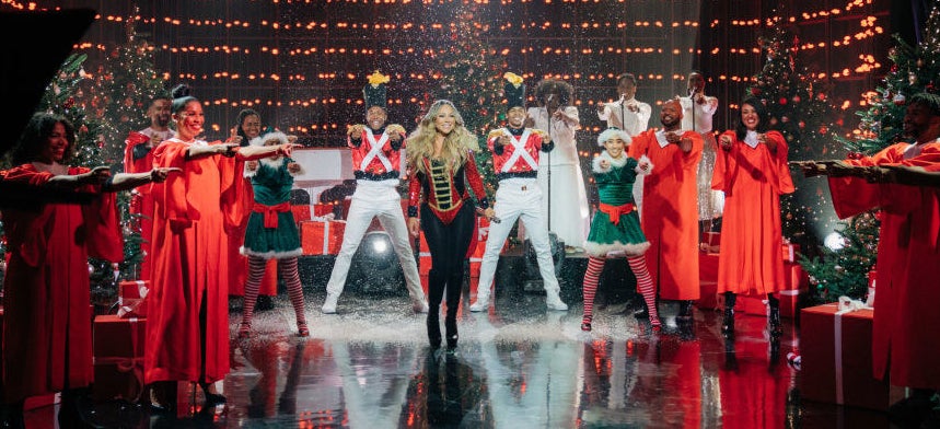 mariah performing on christmas-themed stage