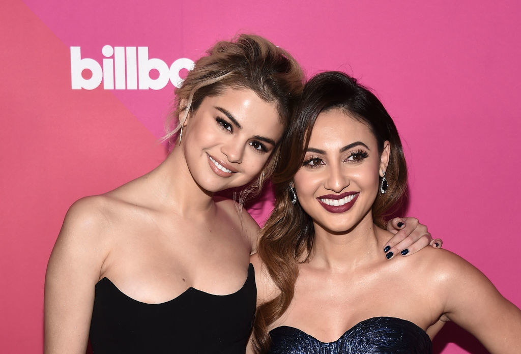 Singer Selena Gomez (L) and actress Francia Raisa arrive at Billboard Women In Music 2017
