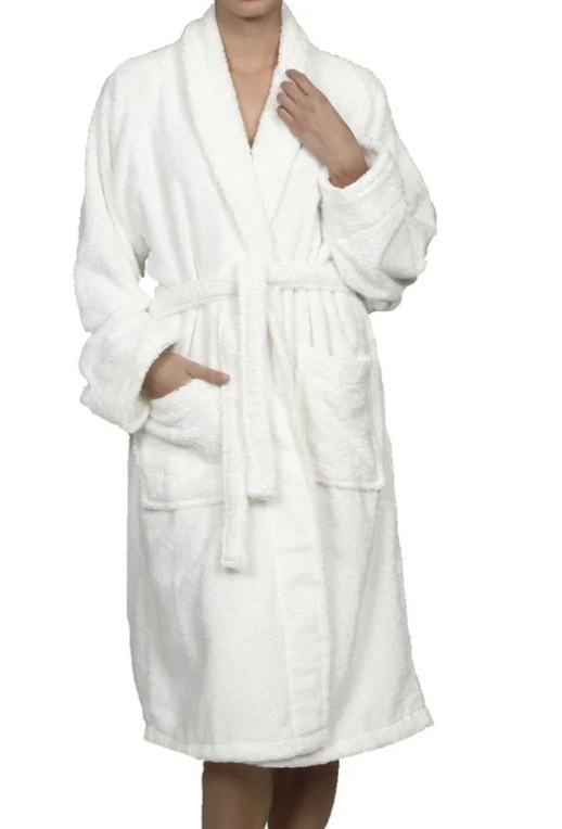 The model shows off the white fluffy robe