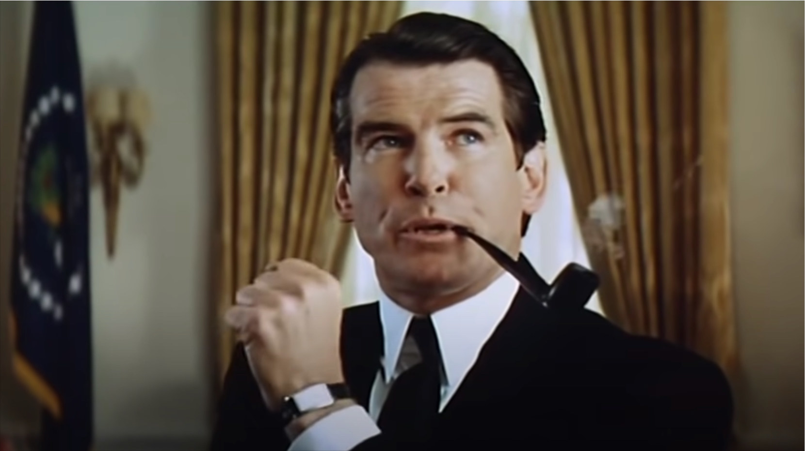 Pierce Brosnan smoking a pipe in Mars Attacks