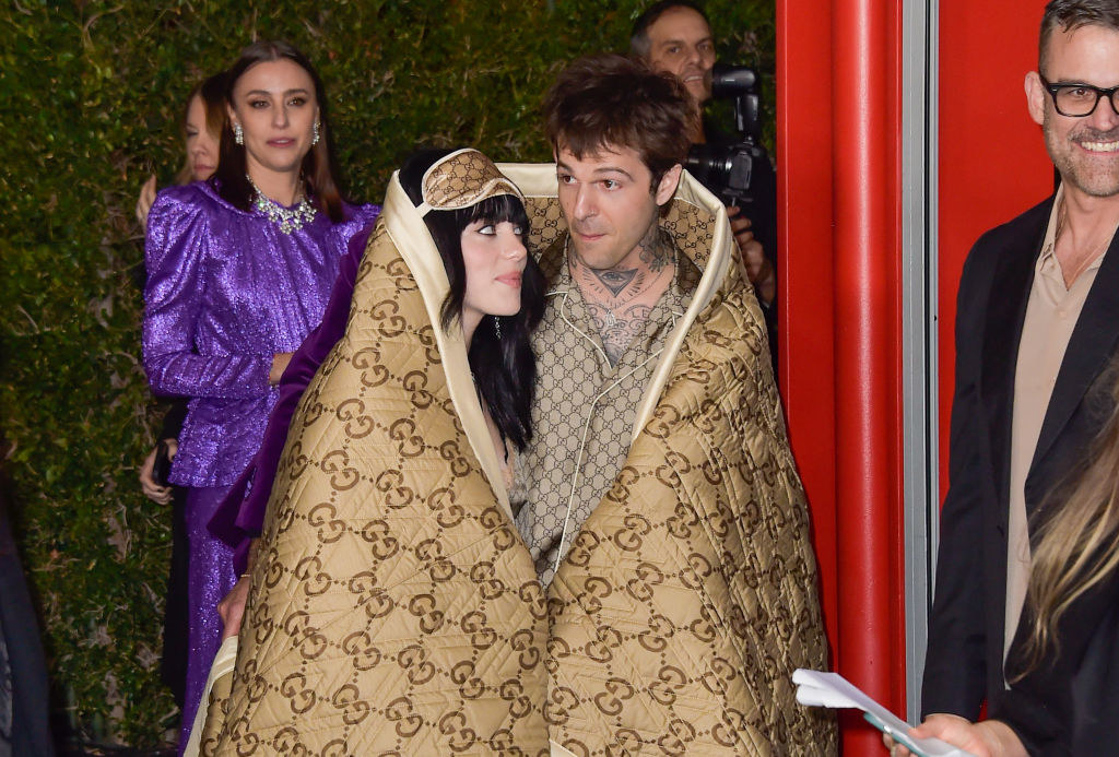 Billie Eilish and Jesse Rutherford wrapped in a Gucci blanket