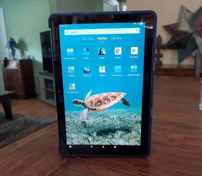 Reviewer&#x27;s Fire tablet standing up on desk