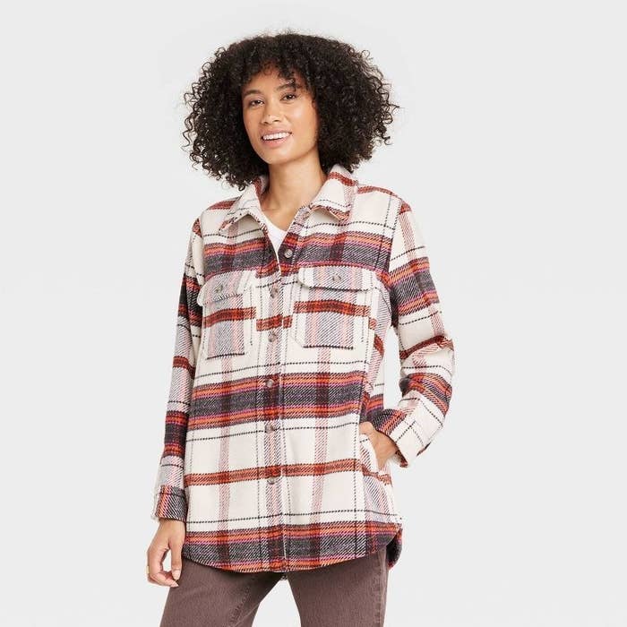 Model wearing red and white plaid shacket