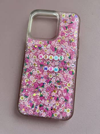 buzzfeed editor's pink phone case filled with different sprinkles and 