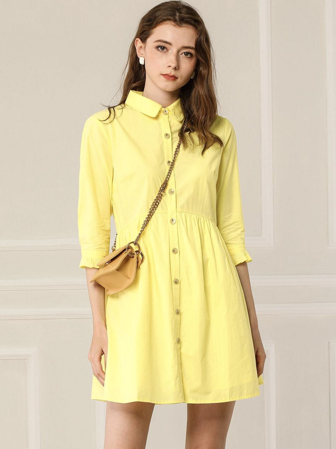 model wearing the dress in yellow