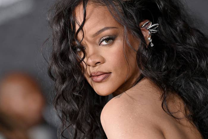 Rihanna wants to cheer up a troubled world with fashion show