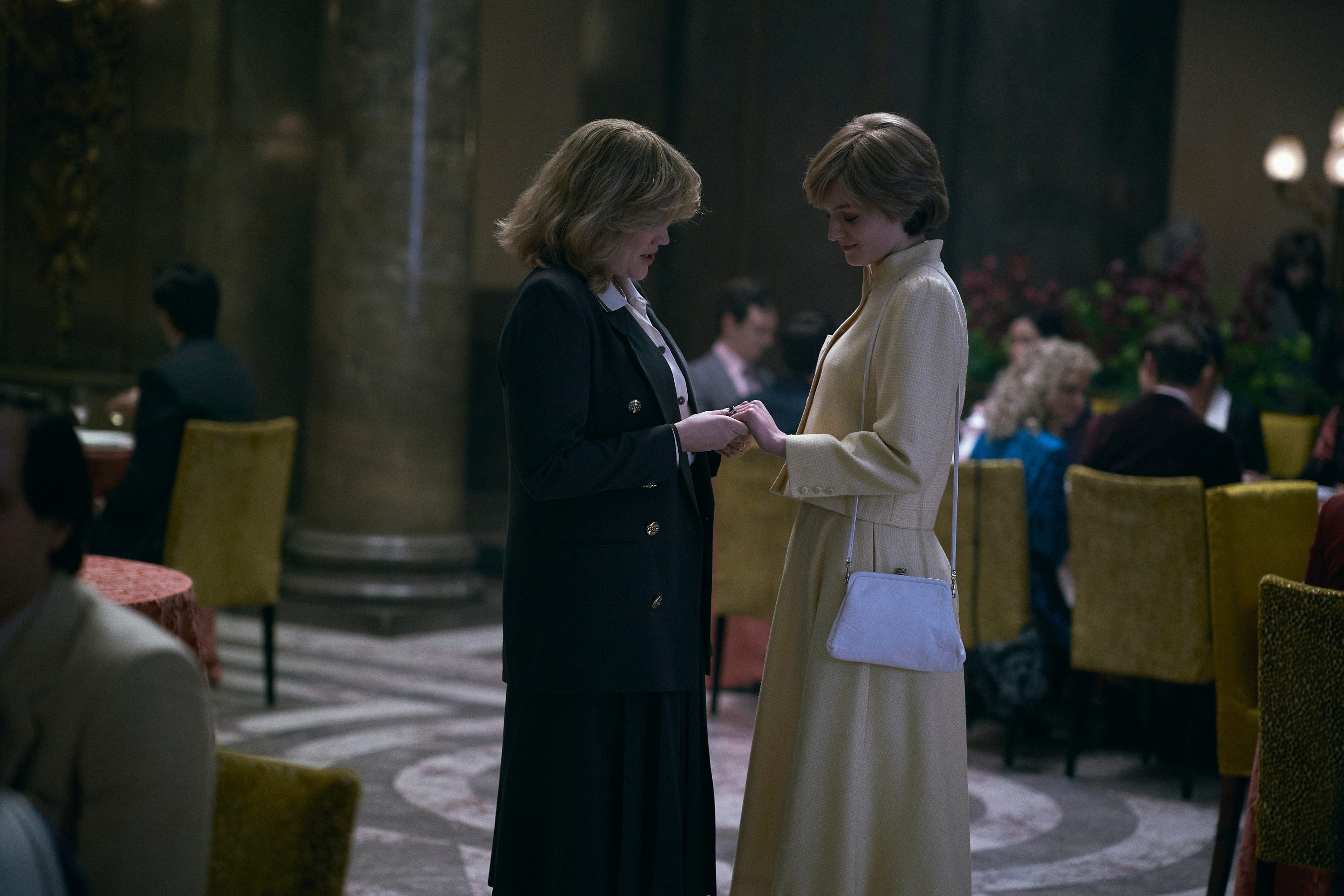 Emma as Princess Diana shows Emerald as Camilla her ring