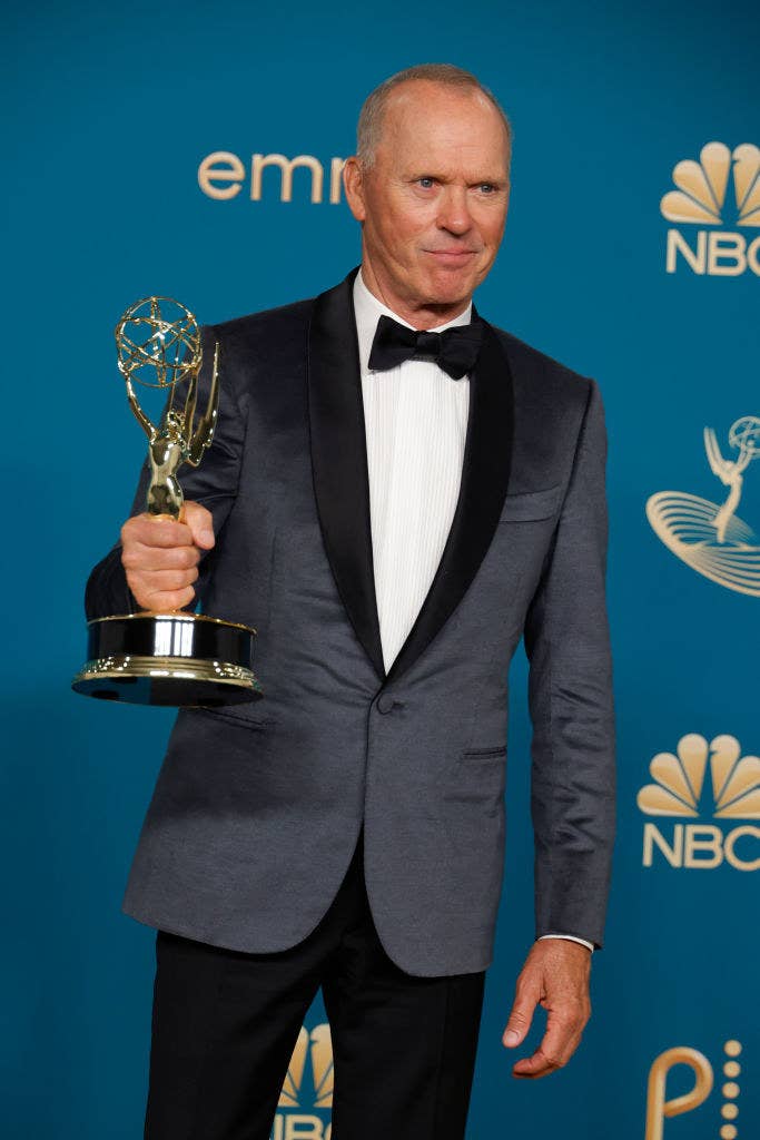 Michael Keaton holding an Emmy