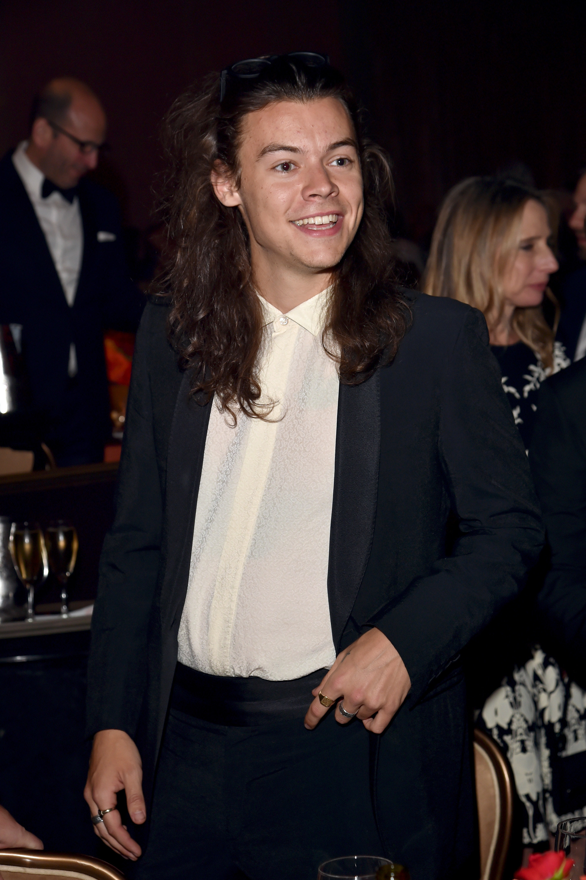 Harry Styles smiling at an event