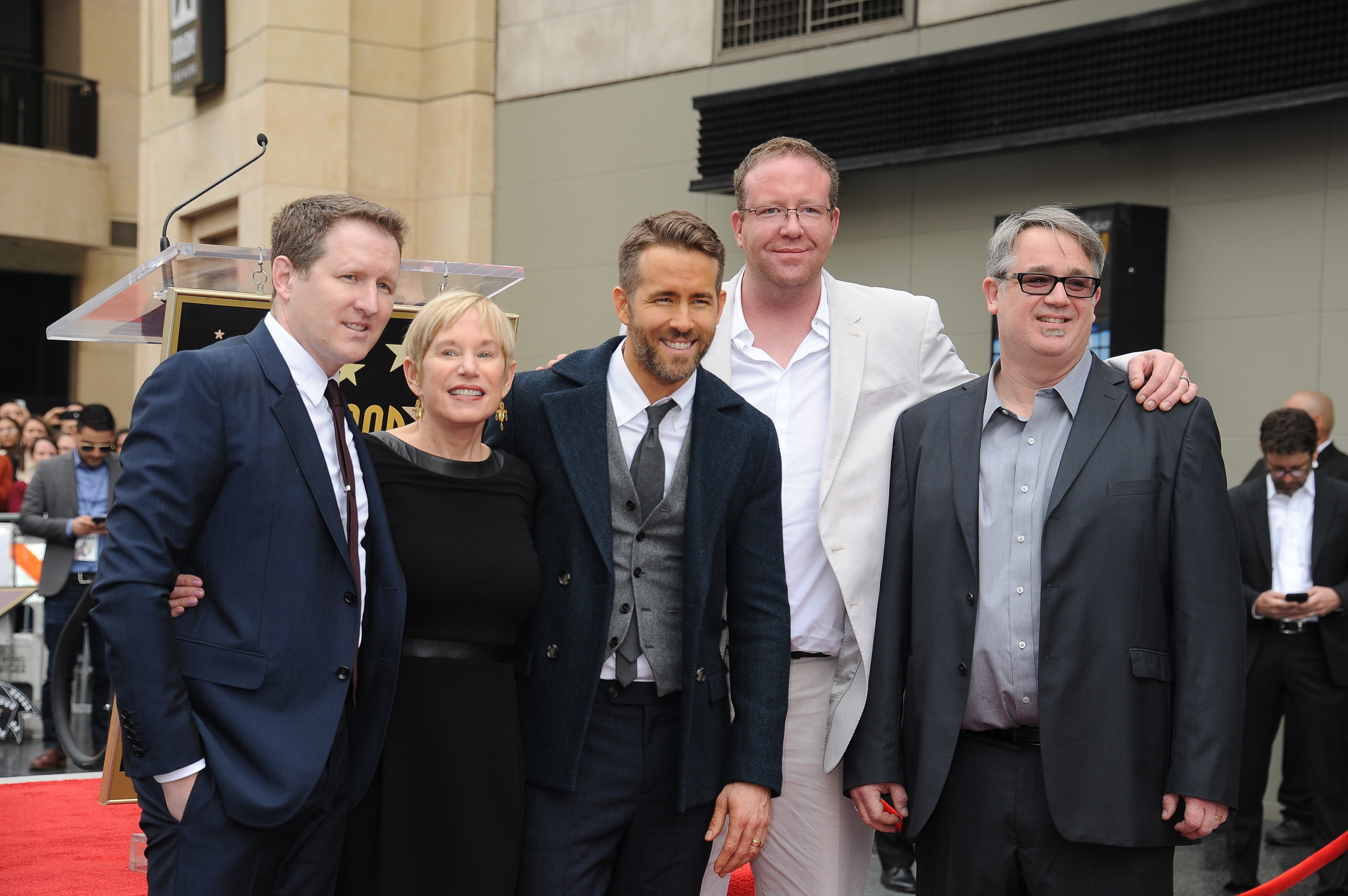 Ryan poses with his brothers and mom