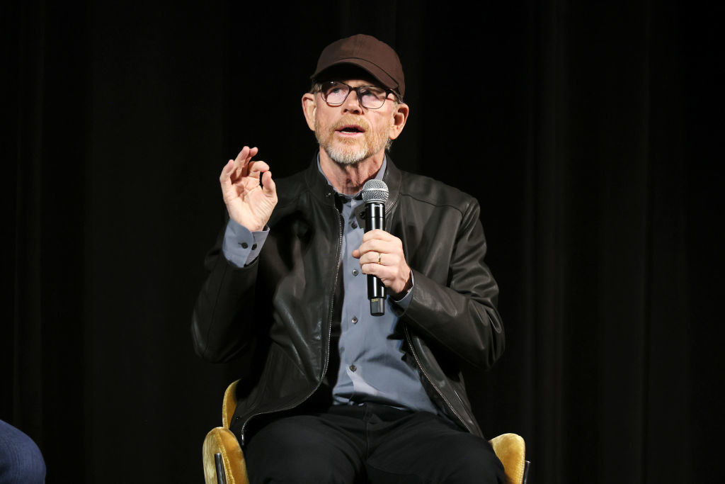 Ron Howard holding a microphone