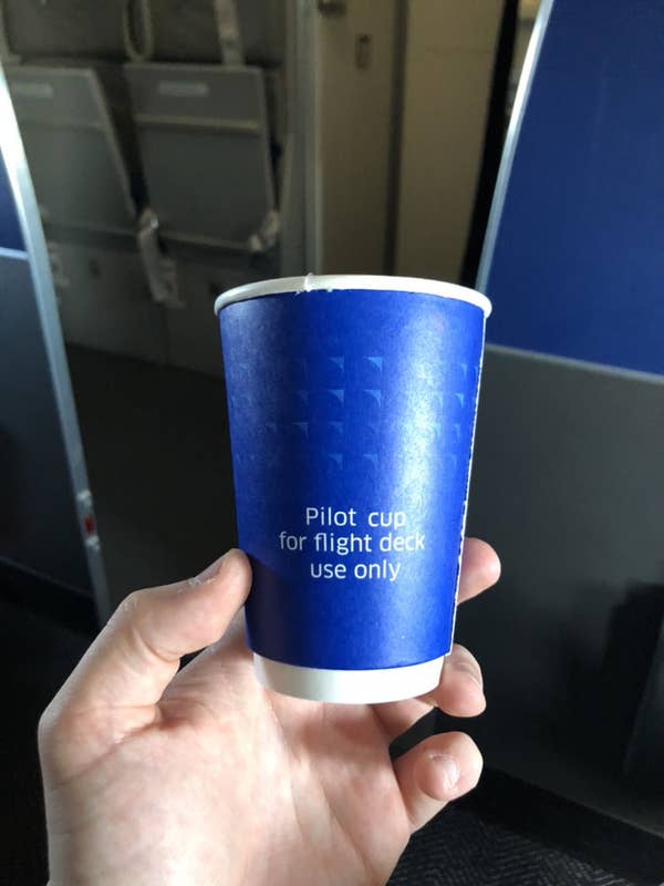 Cup reading &quot;Pilot cup for flight deck use only&quot;