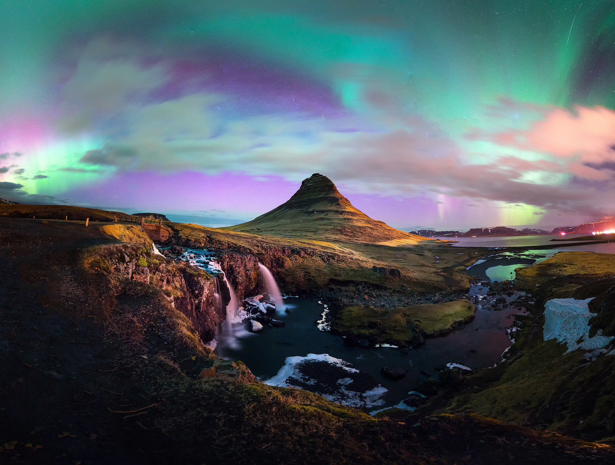 Northern lights over a mountain in Iceland