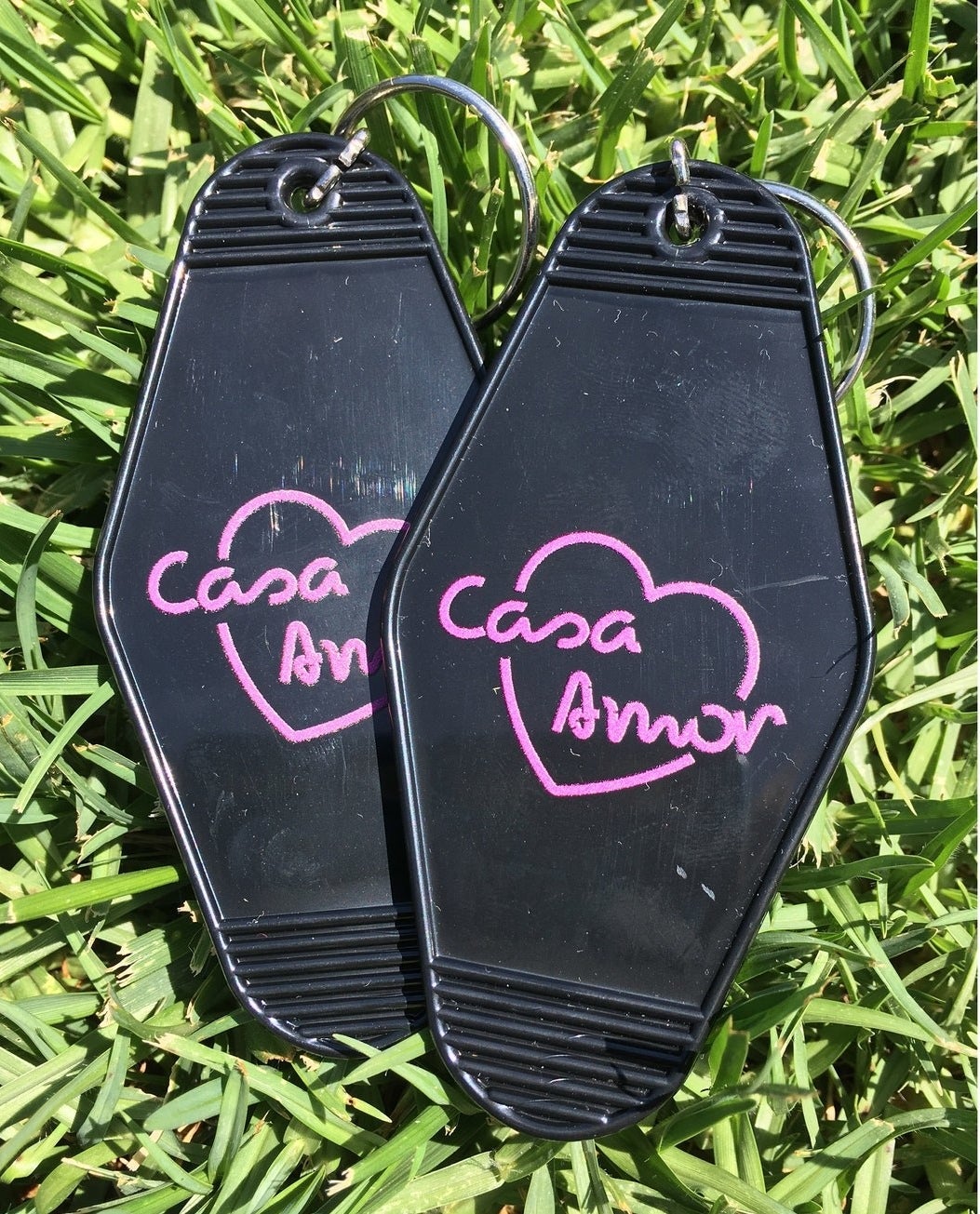 The rhombus keychain with "Kellerman's mountain house Catskills NY" on one side and "I carried a watermelon" on the other