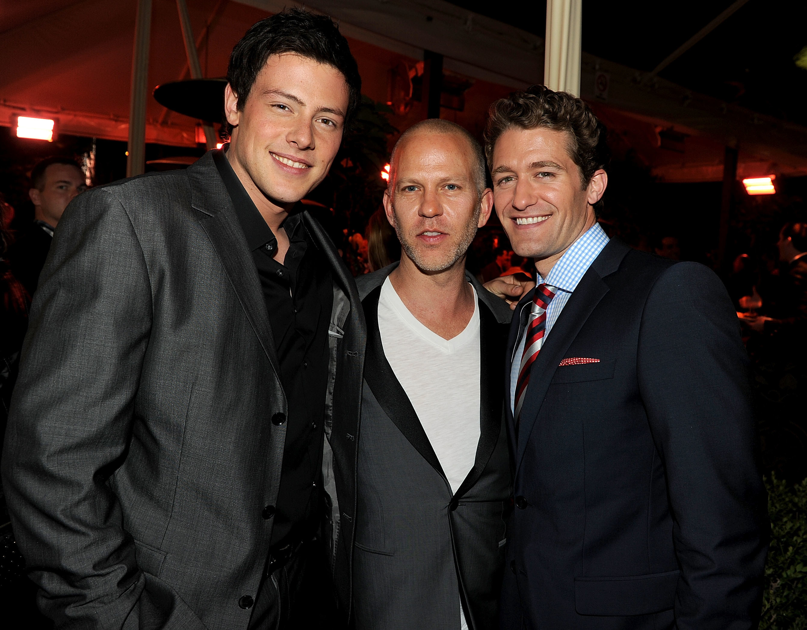 Cory, Ryan, and Matthew Morrison pose together for a photograph at an event