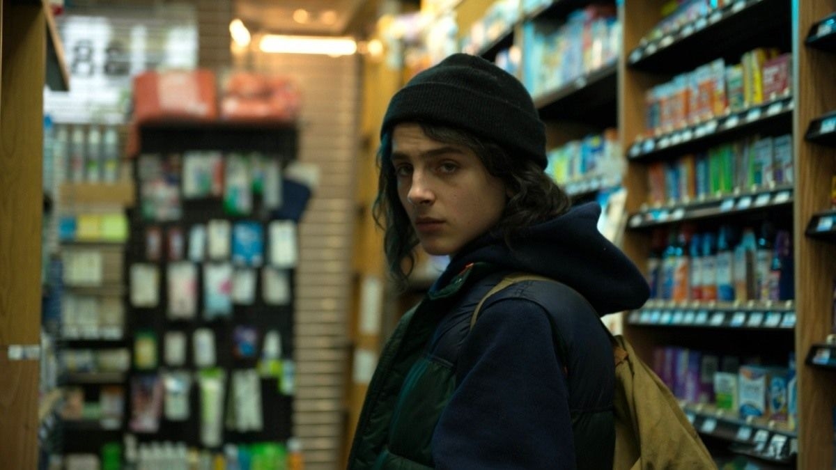 TImothee Chalamet stands in a convenience store
