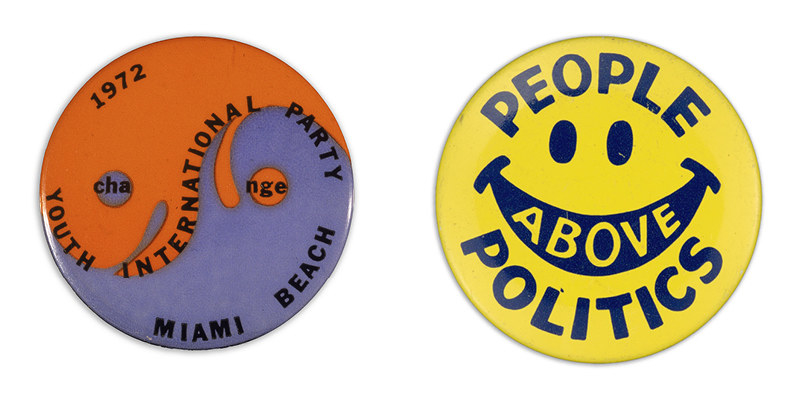 A button resembling a ying-yang symbol reads &quot;youth international party, 1972, Miami beach&quot; beside a smiley face button with the words &quot;people above politics&quot;