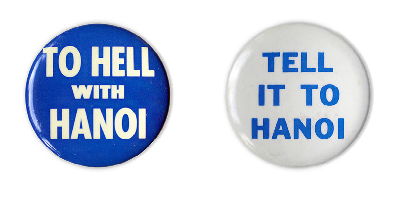 Two buttons read &quot;To hell with Hanoi&quot; in white text over blue background, and &quot;Tell it to Hanoi&quot; in blue text over a white background