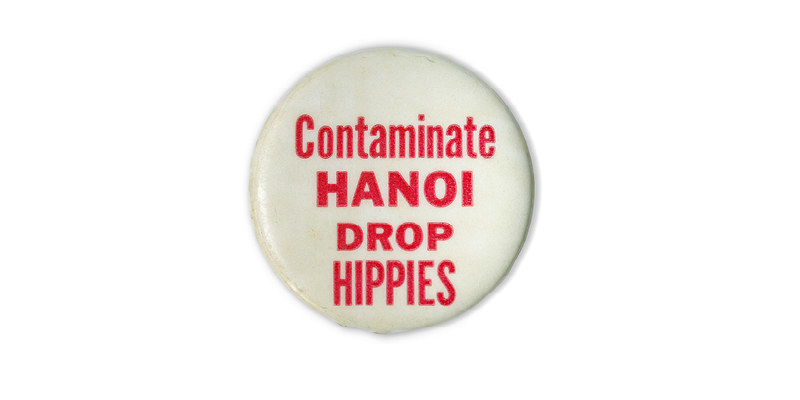 A button reads in red text over a white background: &quot;contaminate Hanoi, drop hippies&quot;