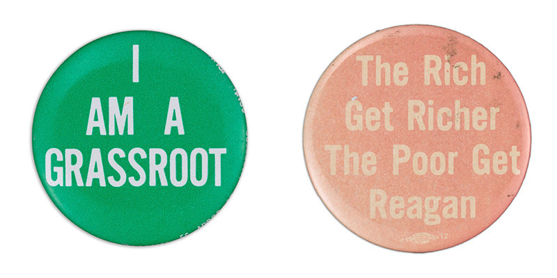 two buttons read &quot;I am a grassroot&quot; in all capital letters, and another reading &quot;the rich get richer, the poor get Reagan&quot;
