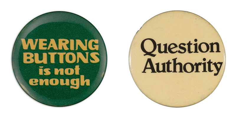 Buttons read &quot;Wearing buttons is not enough&quot; and &quot;question authority&quot;